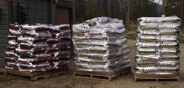 6,000 pounds of dog food, ready to be stacked in the garage.